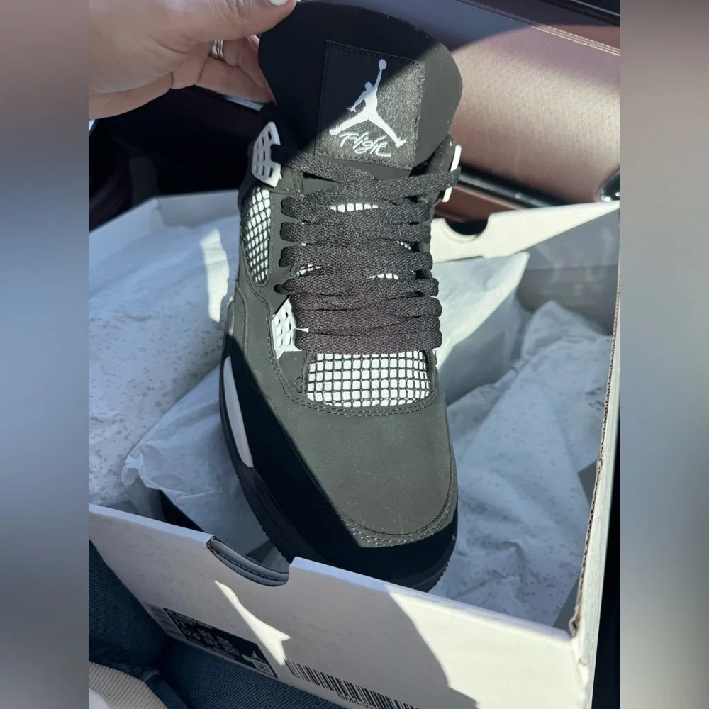 Jordan Men’s Black and White Air Retro Sneaker